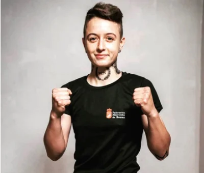 Female Boxer Tatiana Perez Holding Fists Up